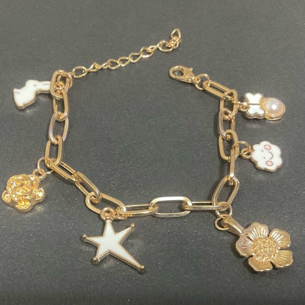 Custom made white & gold whimsical charm bracelet